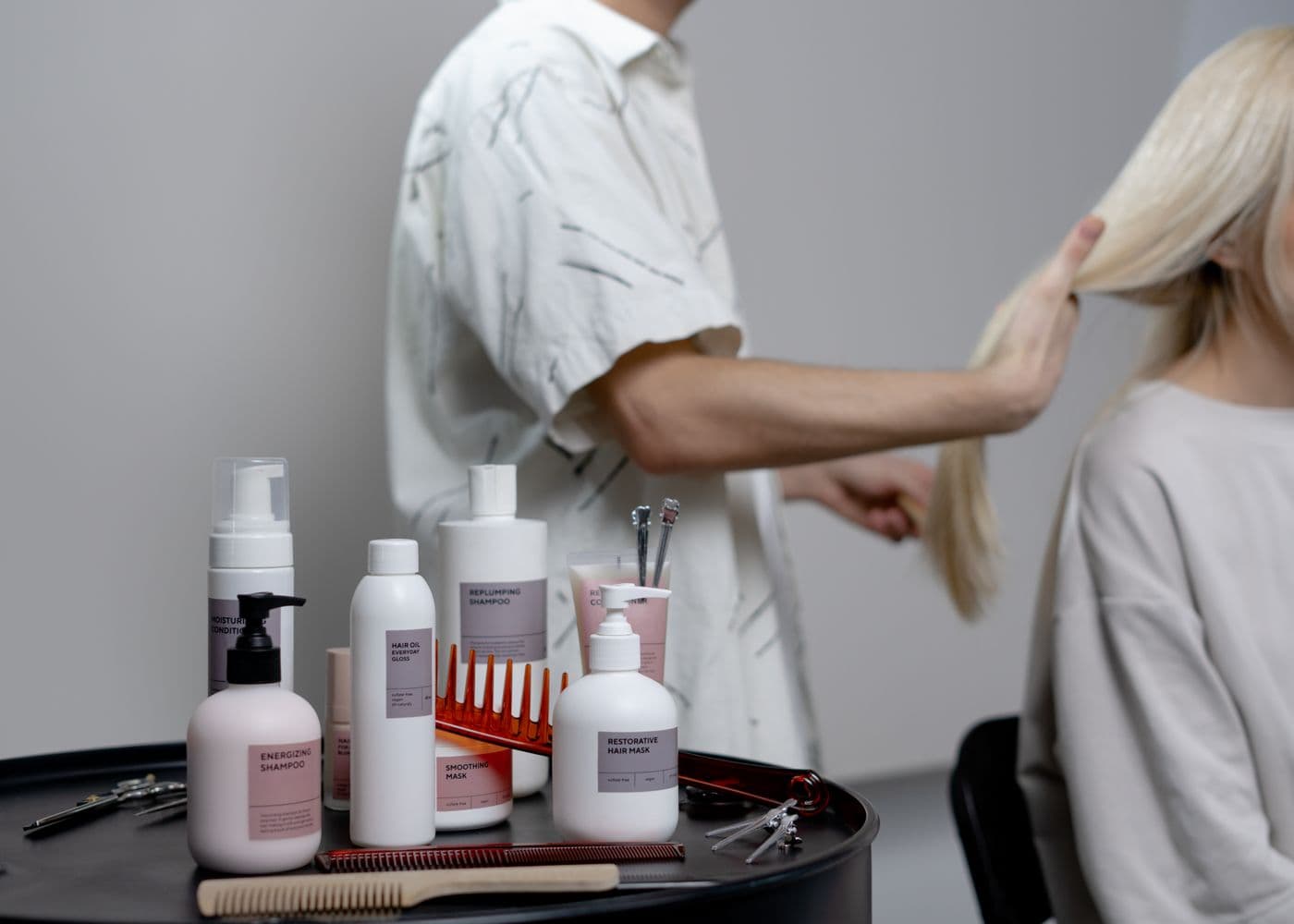 Professional hair care products arranged on a workstation