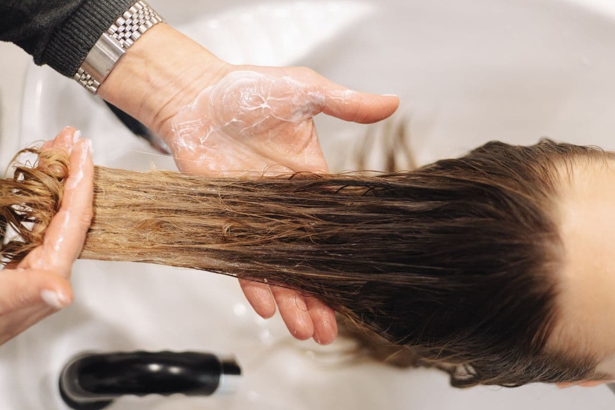 Close-up of a hair treatment being applied